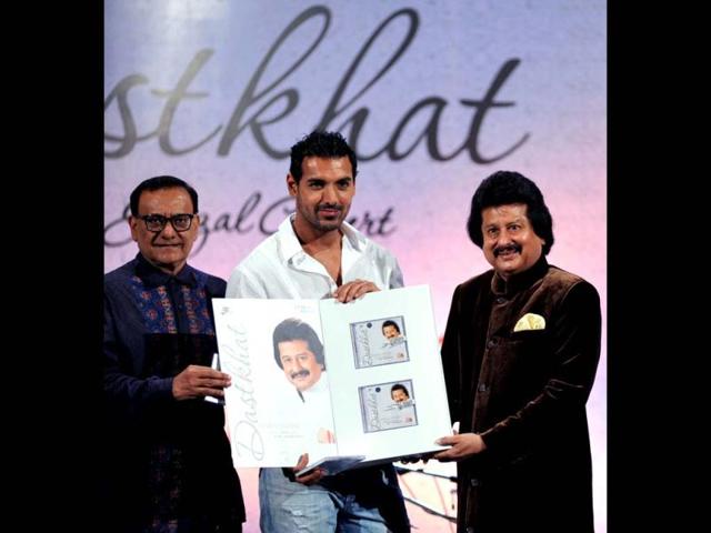 John Abraham with composer Amarjeet Bajwa and singer Pankaj Udhas. (Photo/AFP)