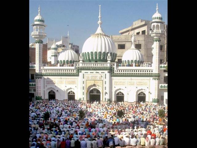 Muslims offer namaz on the occasion of Eid-ul-Zuha at Kherudin Jama Masjid in Amritsar. PTI Photo