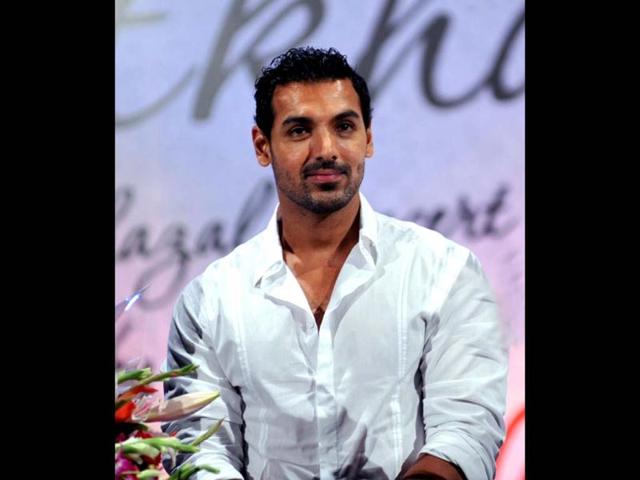 John Abraham graced the unveiling of Pankaj Udhas' new album Dastkhat in Mumbai. (Photo/AFP)