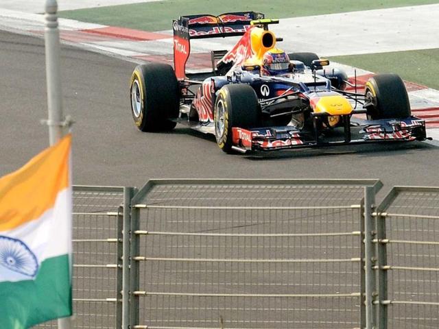 Red Bull-Renault driver Mark Webber of Australia powers his car during the qualifying session at the Buddh International circuit in Greater Noida. AFP Photo