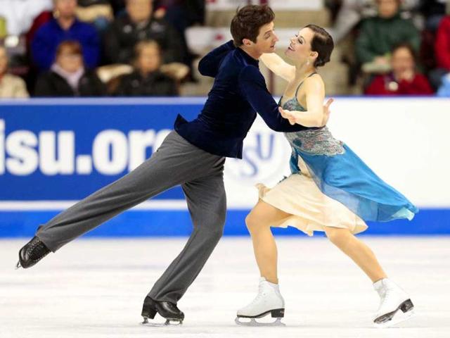 Tessa Virtue and Scott Moir of Canada perform their short program in the dance competition at the 2012 Skate Canada International ISU Grand Prix event in Windsor, Ontario. AFP/Geoff Robins