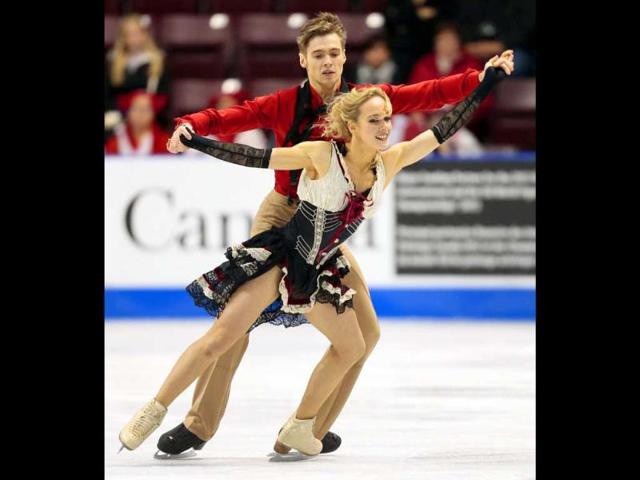 Pernelle Carron and Lloyd Jones of France prform their short program in the dance competition at the 2012 Skate Canada International ISU Grand Prix event in Windsor, Ontario. AFP/Geoff Robins