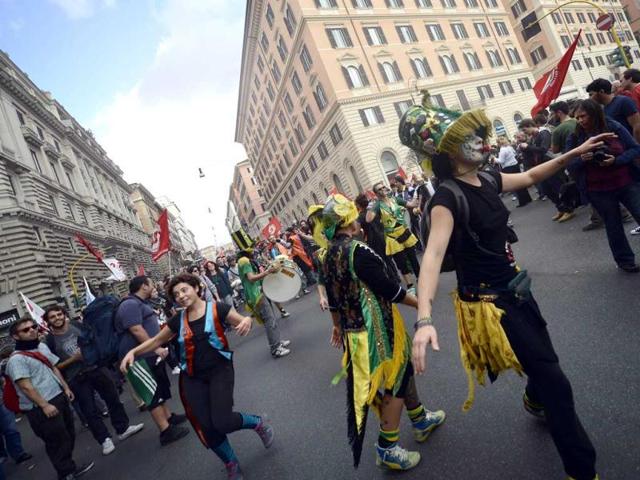 Demonstrators dance during the 'No Monti Day' demonstration in Rome. The 'No Monti Day' demonstration is organized by the small left-wing parties and various protest groups against Italian Prime Minister Mario Monti's austerity measures. AFP photo
