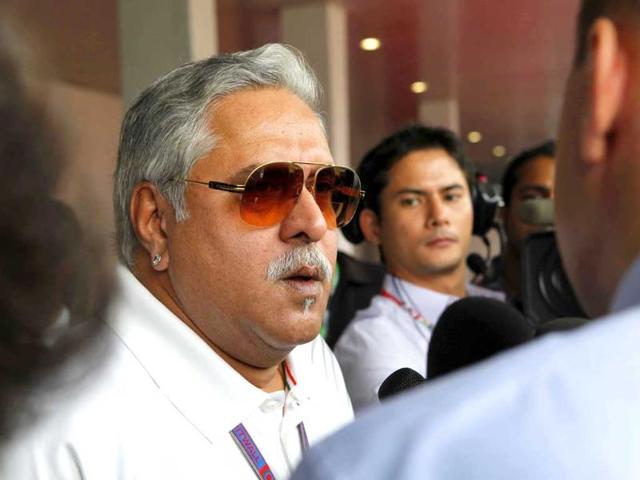 Vijay Mallya arrives in the paddock during final practice prior to qualifying for the Indian Formula One Grand Prix at Buddh International Circuit in Noida. HT Photo/Virendra Singh Gosain