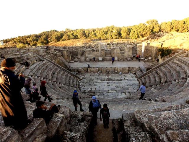 People walk at the ruins of the ancient Greek and Roman city of Cyrene, in modern-day Shahhat. Reuters Photo