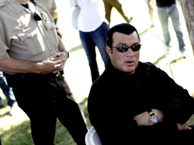 Steven Seagal waits to introduce Maricopa County Sheriff Joe Arpaio (not pictured) during a campaign rally for Arpaio in Mesa, Arizona. Reuters Photo