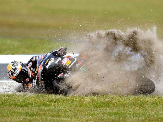 Moto3 rider Niklas Ajo of Finland crashes on turn 4 during the Moto3 race at of the MotoGP Australian Grand Prix at Phillip Island, Australia. AP Photo