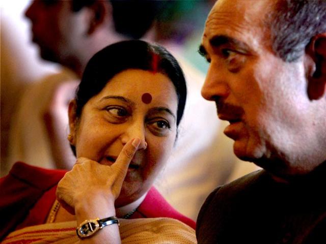 Union minister Ghulam Nabi Azad and leader of Opposition in the Lok Sabha Sushma Swaraj during the swearing-in ceremony for the new ministers at Rashtrapati Bhavan in New Delhi. PTI Photo