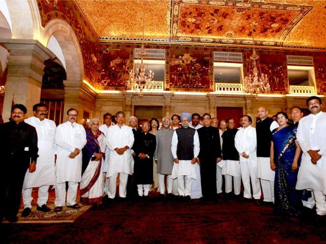 President Pranab Mukherjee, vice president Hamid Ansari and Prime Minister Manmohan Singh with newly sworn-in ministers at Rashtrapati Bhavan in New Delhi. PTI Photo