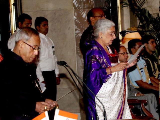 Chandresh Kumari is sworn-in as a cabinet minister by President Pranab Mukherjee during a ceremony at Rashtrapati Bhavan in New Delhi. PTI Photo