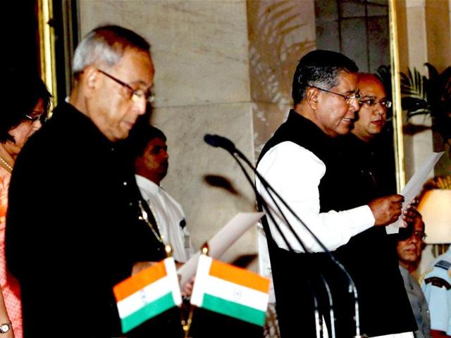 K Rehman Khan is sworn-in as a cabinet minister by President Pranab Mukherjee during a ceremony at Rashtrapati Bhavan in New Delhi. PTI Photo