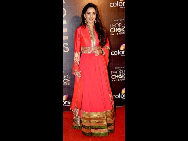 Madhuri Dixit-Nene looked a tad predictable but elegant nevertheless in a fuschia Manish Malhotra outfit.