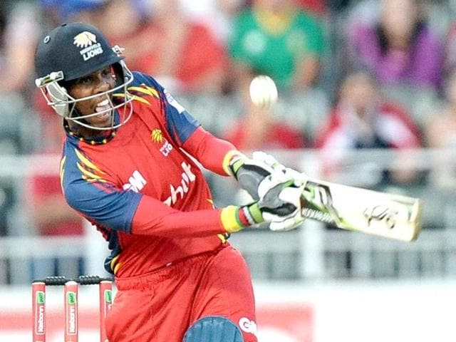 Highveld Lions batsman Thami Tsolekile plays a shot on during the final Champions League T20 (CLT20) match against the Sydney Sixers at the Wanderers Stadium in Johannesburg. AFP Photo / Stephane De Sakutin