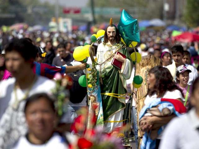 A statue of Saint Jude, the Catholic saint of lost causes, is seen on the surroundings of the church of San Hipolito in Mexico City. Thousands flocked to the church of San Hipolito as part of an annual pilgrimage honoring Saint Jude. (AP Photo)
