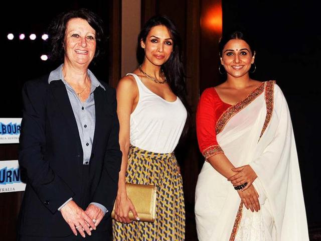 Australian Minister for Tourism in Victoria, Louise Asher (L), Bollywood actress Malaika Arora Khan (C), and Bollywood actress and brand ambassador for Melbourne's Indian Film Festival, Vidya Balan, pose for a photo during the announcement of the brand ambassador in Mumbai. (AFP)