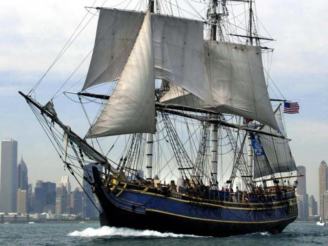 A file photo shows the HMS Bounty sailing past the Chicago skyline. The HMS Bounty crew abandoned the ship due to Hurricane Sandy, the US Coast Guard announced. AFP/Jeff Haynes