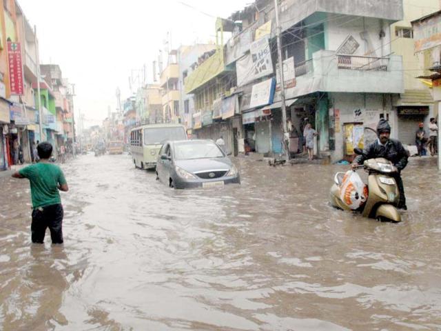 A water-logged Dr Besant Road following heavy rains due to Cyclonic Storm Nilam in Chennai. UNI Photo