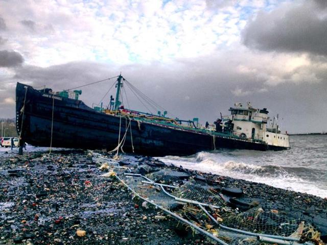 A 168-foot water tanker, the John B Caddell, sits on the shore where it ran aground on Front Street in the Stapleton neighborhood of New York's Staten Island as a result of superstorm Sandy. AP Photo