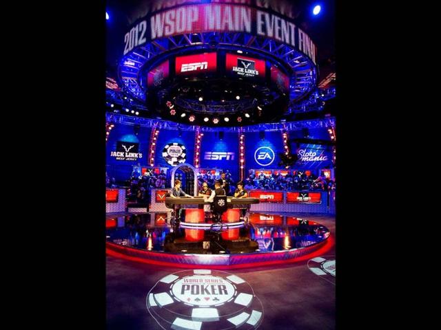 From left, Jake Balsiger, Greg Merson and Jesse Sylvia begin play during the World Series of Poker final table in Las Vegas. AP Photo/Julie Jacobson