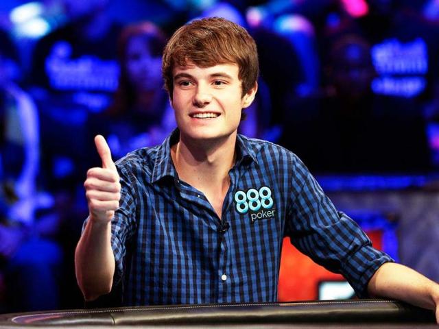 Jake Balsiger reacts to supporters after betting all in and winning the pot on a hand during the World Series of Poker Final Table event in Las Vegas. AP Photo/Julie Jacobson