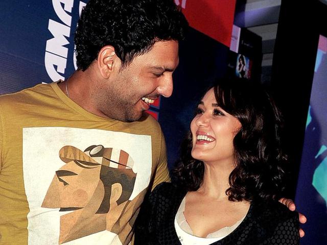 Preity Zinta and Indian cricketer Yuraj Singh chat at the event. (AFP Photo)