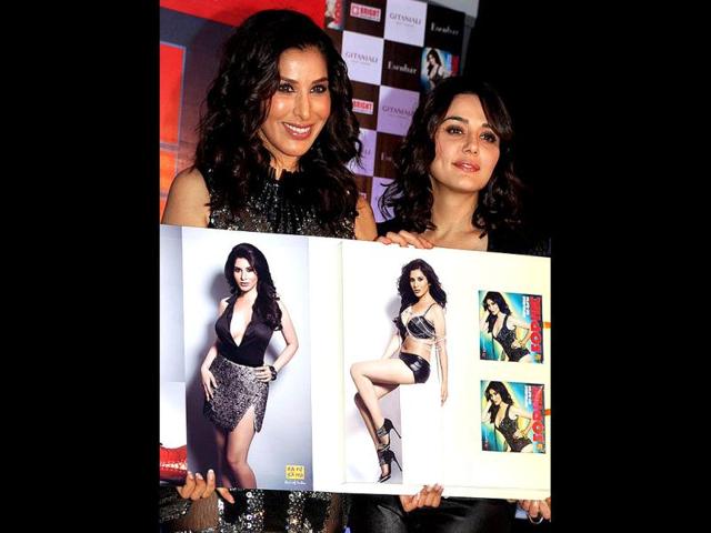 Preity Zinta has apparently become more social these days, the actress was spotted promoting singer Sophie Choudry's new music video Hungama Ho Gaya, a remix of the yesteryear song, in Mumbai on October 30. (AFP Photo)