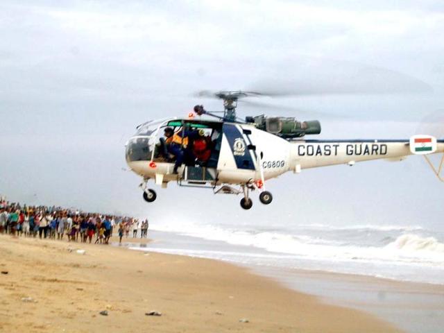Indian Coast Guard helicopter rescued crew members of ship Pratibha Cauvery after it ran aground off Marina Coast due to cyclonic storm Nilam , in Chennai . Agencies