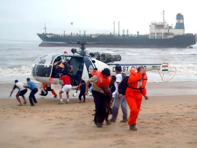 Indian Coast Guard helicopter rescued crew members of ship Pratibha Cauvery after it ran aground off Marina Coast due to Cyclonic Storm ' Nilam ' , in Chennai . Agencies