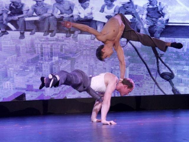 Dancers from the world famous cabaret troupe, Moulin Rouge from Paris, perform acrobatic stunts in Gurgaon. HT/Manoj Kumar