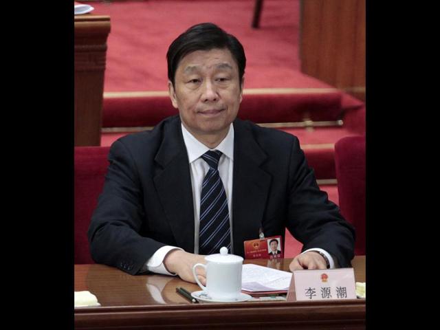 Li Yuanchao attends the closing ceremony of the NPC at the Great Hall of the People in Beijing. Reuters file photo
