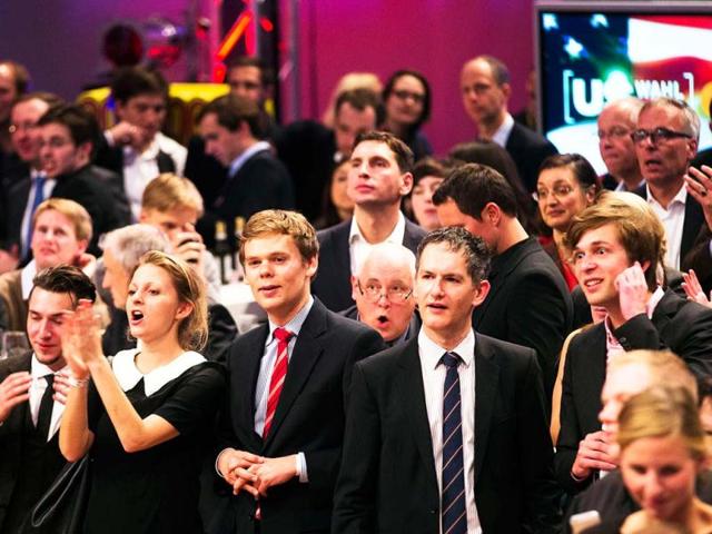 People react as a television promoter announces results of the United States elections during a Presidential Election party hosted by the United States embassy and German Telekom in Berlin. AP Photo