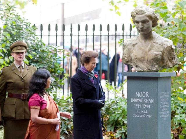 Britain's Princess Anne looks at a statue of Noor Inayat Khan after unveiling it in a ceremony in Gordon Square Gardens, central London. Noor Inayat Khan worked as a radio operator for the Women's Auxiliary Air Force before being recruited by the Special Operations Executive as an agent, working behind enemy lines in Paris, France. AFP photo