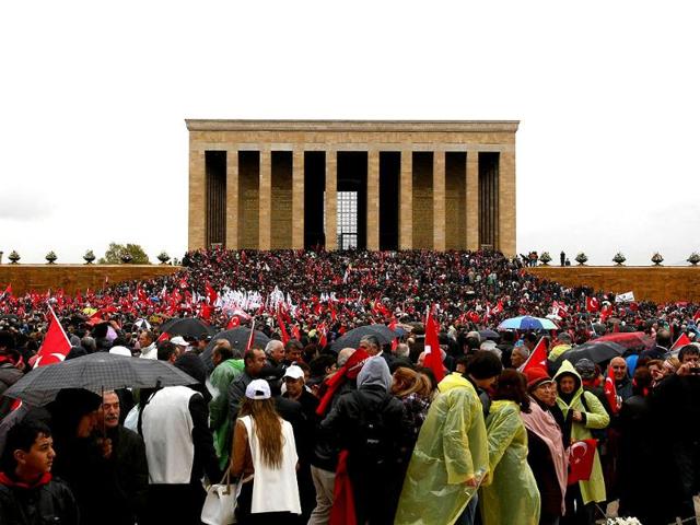 People gather at the mausoleum of Turkey's founder Mustafa Kemal Ataturk during a ceremony marking the 74th anniversary of his death in Ankara. AFP/Adem Altan