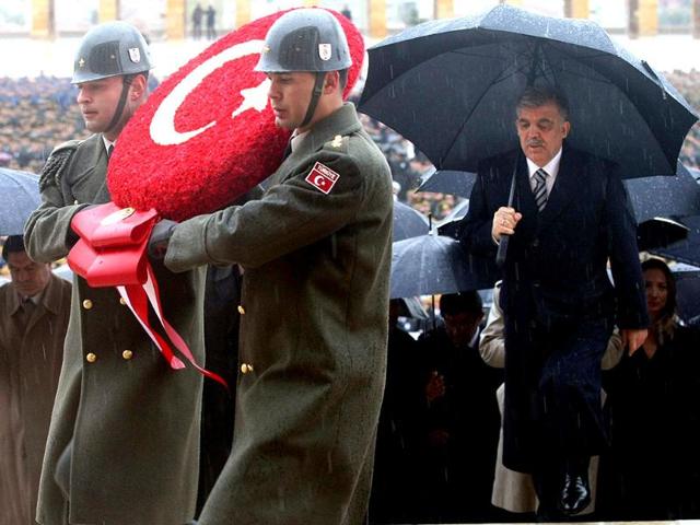 Turkish President Abdullah Gul, ministers and army commanders follow a guard of honour at the mausoleum of Turkey's founder Mustafa Kemal Ataturk during a ceremony marking the 74th anniversary of his death in Ankara. AFP/Adem Altan