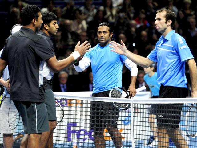 Mahesh Bhupathi and Rohan Bopanna shake hands at the net with Leander Paes and Czech Republic's Radek Stepanek after Bhupathi and Bopanna won their semi-final doubles match on the seventh day of the ATP World Tour Finals tennis tournament in London. AFP/Glyn Kirk