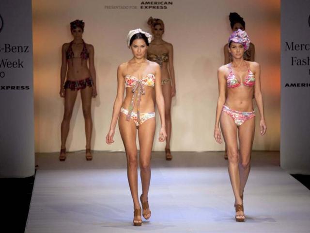 Models wears creations by Mexico's designer Pineda Covalin at the Mercedes Benz Fashion show in Mexico City. (AP Photo)