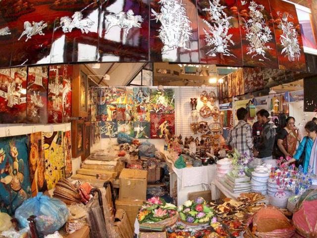 Visitors at a stall at the India International Trade Fair in New Delhi . PTI Photo