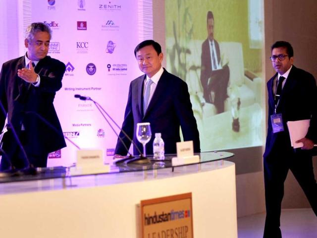 Thaksin Shinawatra, former Thai PM, is seen with HT editor-in-chief Sanjoy Narayan and IBN Network's Rajdeep Sardesai at the Hindustan Times Leadership Summit in New Delhi. HT/Ajay Aggarwal