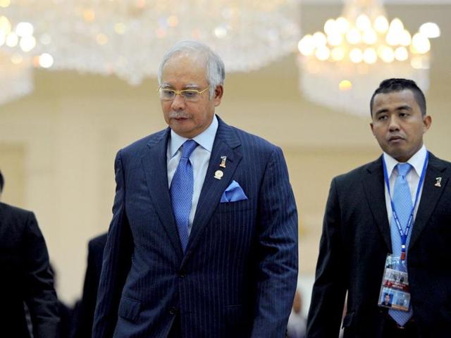 Malaysian Prime Minister Najib Razak leaves the 7th East Asia Summit in Phnom Penh. The Association of Southeast Asian Nations (ASEAN) nations were set to officially launch negotiations to create an enormous free trade pact with China, Japan, India, South Korea, Australia and New Zealand. AFP