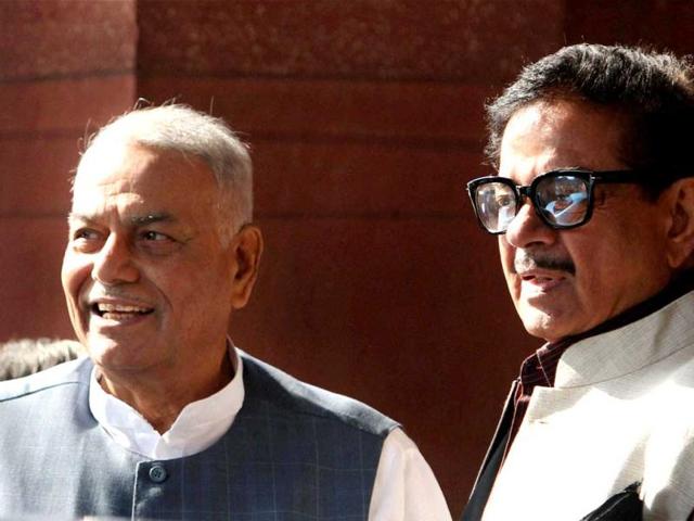 BJPleaders Yashwant Sinha and Shatrughan Sinha at Parliament House on the first day of its winter session in New Delhi. PTI Photo