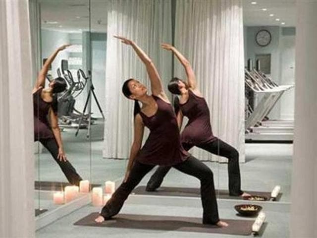 A-woman-practices-yoga-in-the-gym-at-Kimpton-s-Lorien-Hotel-and-Spa-in-Washington-D-C-in-this-May-2009-handout-Credit-Reuters-Fred-Licht-Kimpton-Hotels-and-Restaurants-Handout A-woman-practices-yoga-in-the-gym-at-Kimpton-s-Lorien-Hotel-and-Spa-in-Washington-D-C-in-this-May-2009-handout-Credit-Reuters-Fred-Licht-Kimpton-Hotels-and-Restaurants-Handout