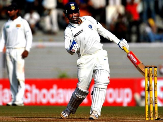 Virendra Sehwag celebrates scoring double century on the second day of the third test between India and Sri Lanka in Mumbai. AFP/Pal Pillai