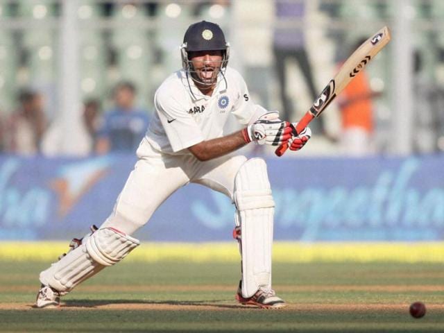 Cheteshwar Pujara in action during the first day of second India-England Test match at Wankhade Stadium in Mumbai . PTI