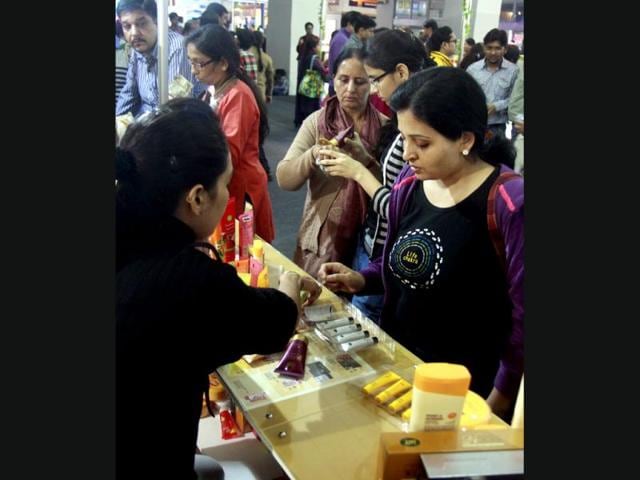 Women visit a pavilion displaying beauty products during the 32nd India International Trade Fair at Pragati maidan in New Delhi. (HT Photo/Sonu Mehta)