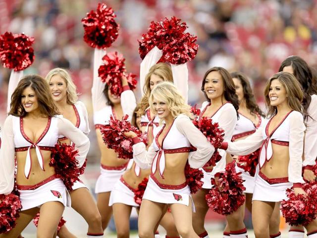 Arizona Cardinals cheerleaders perform before the NFL game against the St. Louis Rams at the University of Phoenix Stadium in Glendale, Arizona. The Rams defeated the Carindals 31-17. AFP Photo