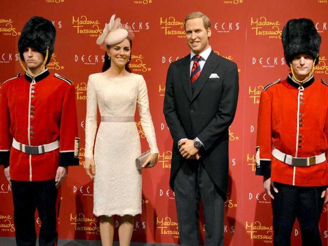 Wax figures of Britain's Catherine, Duchess of Cambridge and Prince William are displayed at a press preview in Tokyo. AFP Photo/Yoshikazu Tsuno