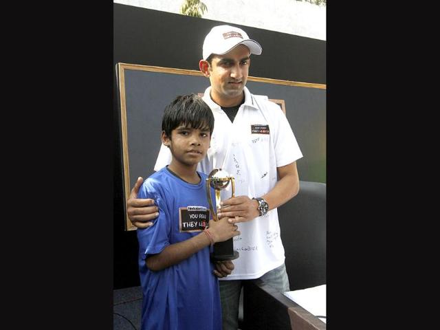 Cricketer Gautam Gambhir during a photo shoot for Hindustan Times initiative 'You Read They Learn' at Pratham centre at Trilokpuri in New Delhi. HT/Virendra Singh Gosain