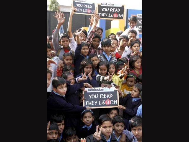 Children having fun during a Hindustan Times initiative 'You Read They Learn' programe at Pratham centre at Trilokpuri in New Delhi. HT/Virendra Singh Gosain