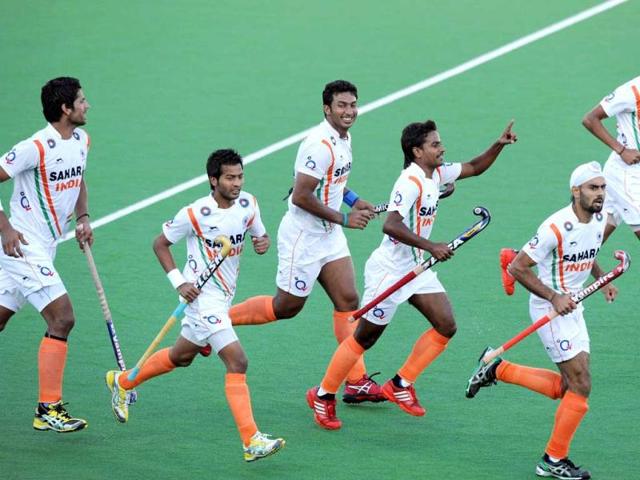 Indian players celebrate after scoring against New Zealand during their Pool A match at the Men's Hockey Championships Trophy in Melbourne. (AFP Photo)