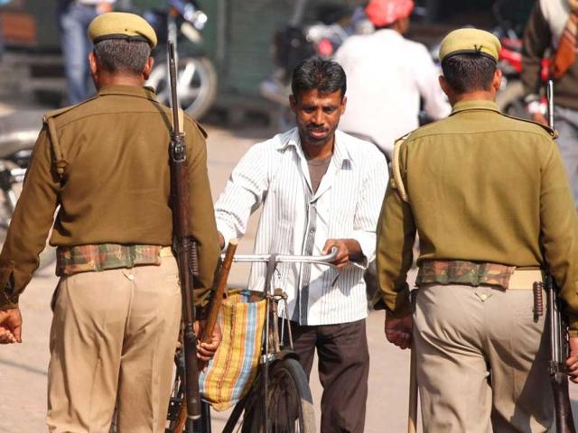 Policemen patrol on the eve of 20th anniversary of the Babri Masjid demolition in Ayodhya. (AFP Photo)